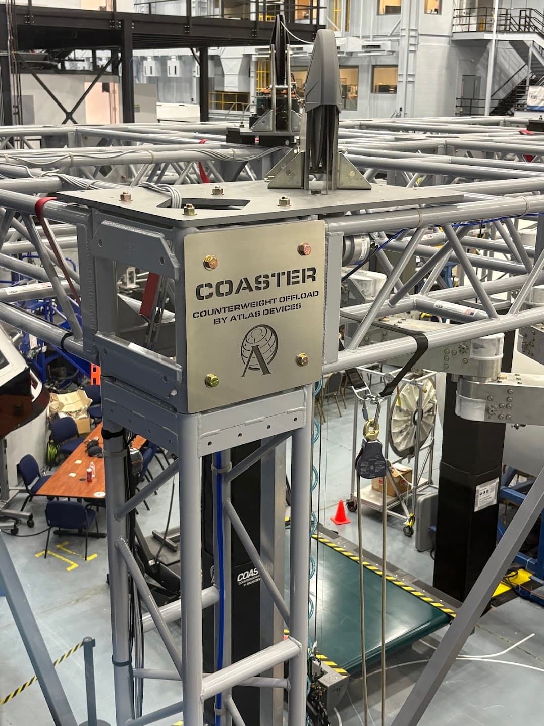 The COASTER device shown inside a spacecraft training and testing facility.